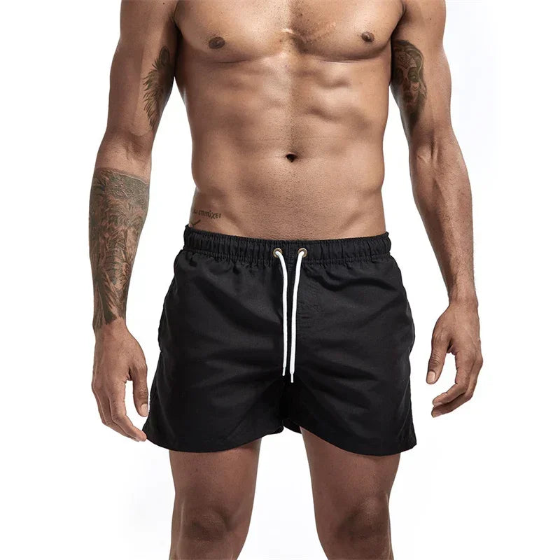 Mens Swim Trunks with Mesh Lining Side Pockets Solid Beach Shorts Quick Dry Lightweight Drawstring Board Shorts Summer Swimwear - Evallys.com