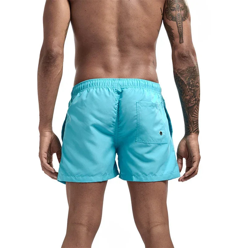 Mens Swim Trunks with Mesh Lining Side Pockets Solid Beach Shorts Quick Dry Lightweight Drawstring Board Shorts Summer Swimwear - Evallys.com