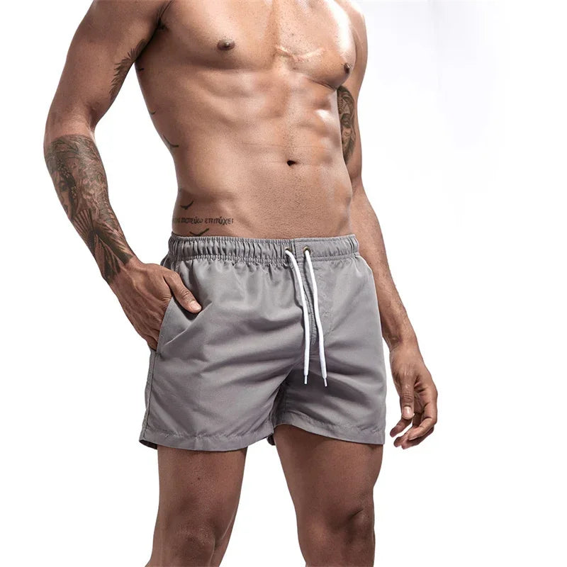 Mens Swim Trunks with Mesh Lining Side Pockets Solid Beach Shorts Quick Dry Lightweight Drawstring Board Shorts Summer Swimwear - Evallys.com