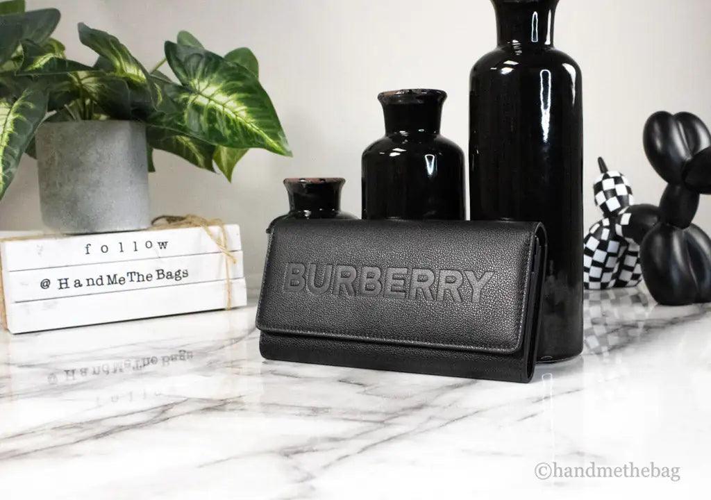 Burberry Porter Black Leather Branded Embossed Clutch Flap Wallet - Evallys.com # #