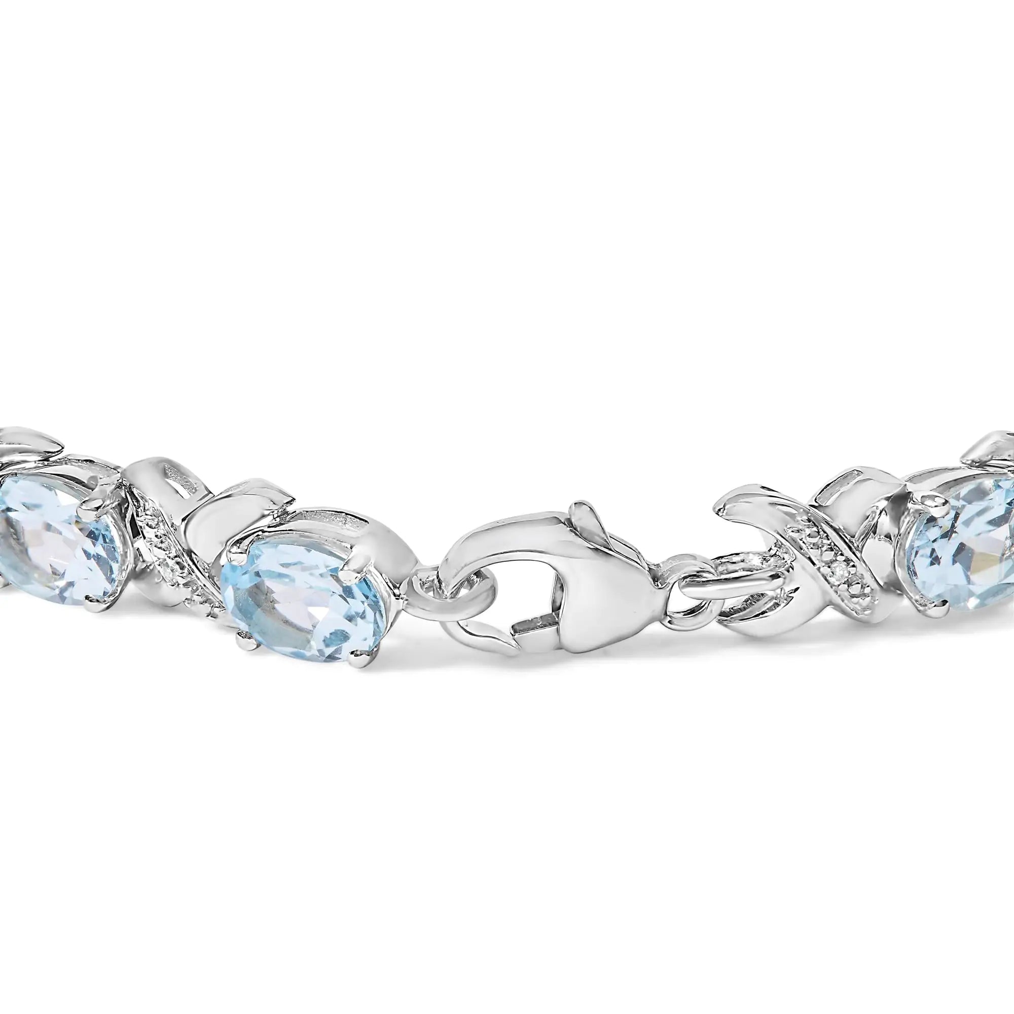 .925 Sterling Silver 16.0 Cttw Oval Blue Topaz and Diamond Accent Tennis X Link Bracelet (I-J Color, I1-I2 Clarity) - Size 7" Inch - Evallys.com # #