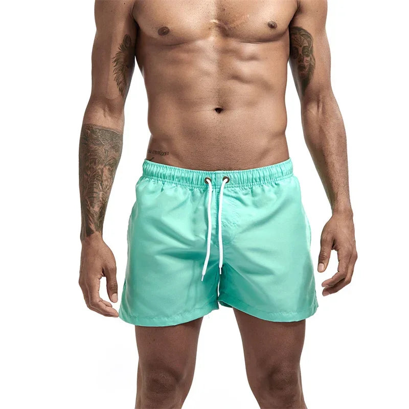 Mens Swim Trunks with Mesh Lining Side Pockets Solid Beach Shorts Quick Dry Lightweight Drawstring Board Shorts Summer Swimwear - Evallys.com