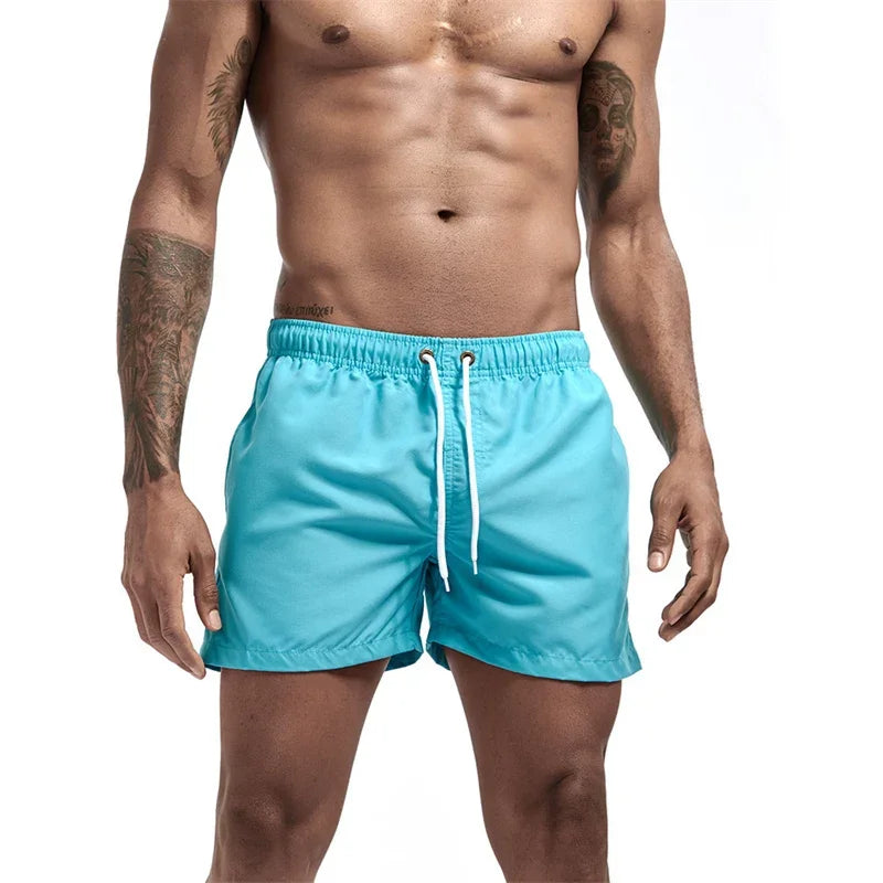 Mens Swim Trunks with Mesh Lining Side Pockets Solid Beach Shorts Quick Dry Lightweight Drawstring Board Shorts Summer Swimwear - Evallys.com