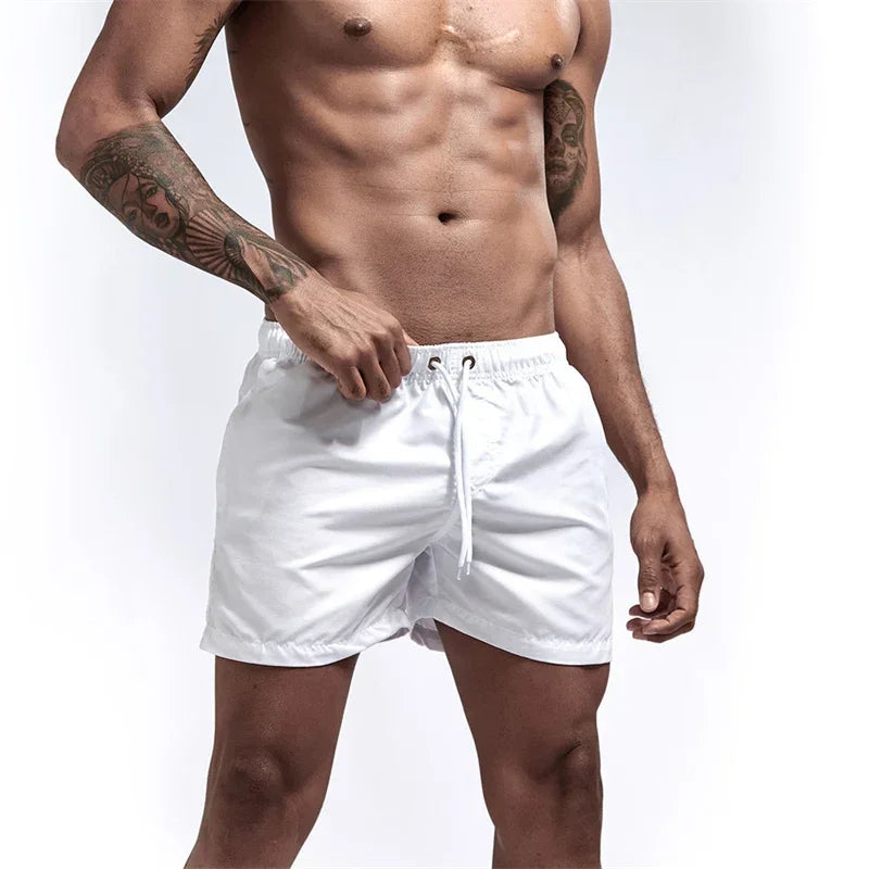 Mens Swim Trunks with Mesh Lining Side Pockets Solid Beach Shorts Quick Dry Lightweight Drawstring Board Shorts Summer Swimwear - Evallys.com