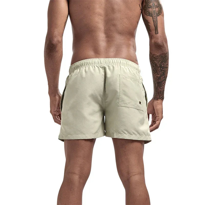 Mens Swim Trunks with Mesh Lining Side Pockets Solid Beach Shorts Quick Dry Lightweight Drawstring Board Shorts Summer Swimwear - Evallys.com