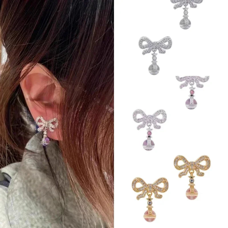 Star Boutique Jewelry Store Hot Selling S925 Silver Bow 3D Saturn Earrings Sweet Women's Jewelry - Evallys.com
