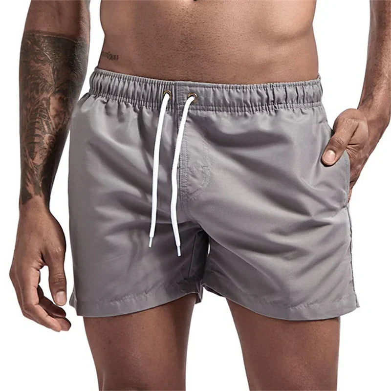 Mens Swim Trunks with Mesh Lining Side Pockets Solid Beach Shorts Quick Dry Lightweight Drawstring Board Shorts Summer Swimwear - Evallys.com