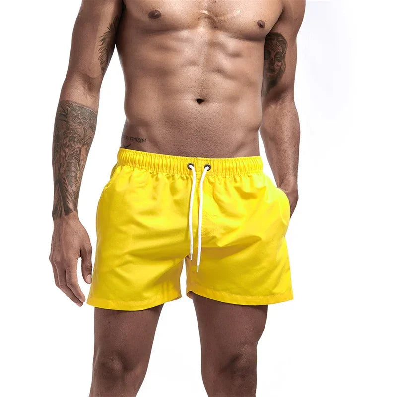 Mens Swim Trunks with Mesh Lining Side Pockets Solid Beach Shorts Quick Dry Lightweight Drawstring Board Shorts Summer Swimwear - Evallys.com