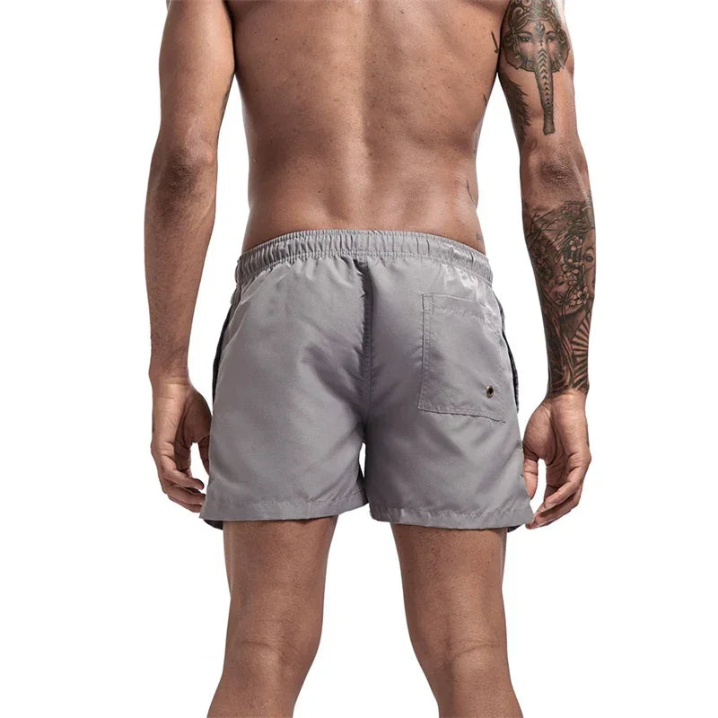 Mens Swim Trunks with Mesh Lining Side Pockets Solid Beach Shorts Quick Dry Lightweight Drawstring Board Shorts Summer Swimwear - Evallys.com