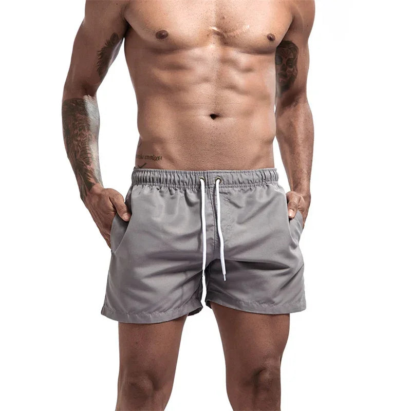 Mens Swim Trunks with Mesh Lining Side Pockets Solid Beach Shorts Quick Dry Lightweight Drawstring Board Shorts Summer Swimwear - Evallys.com