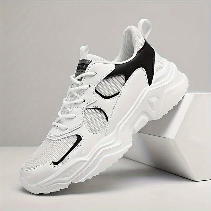 Men's chunky breathable sneakers in white and black, featuring lace closure and mesh design, ideal for casual wear.